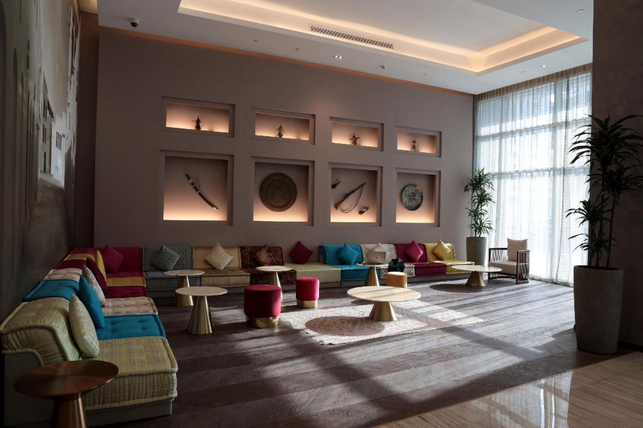 Pullman Sharjah Hotel Eksteriør billede The lobby of the hotel